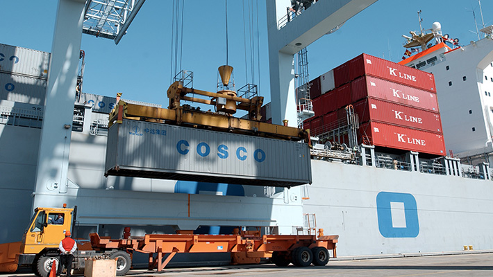Shipping containers loaded off a freight in Boston.