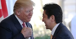 Trump and Japan Prime Minister Shinzo Abe shake hands Trump and Japan Prime Minister Shinzo Abe shake hands