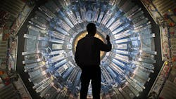 A man stands in front of the Large Hadron Collider at the Science Museum in London. A man stands in front of the Large Hadron Collider at the Science Museum in London.