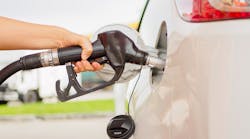 Pumping gas into car Pumping gas into car