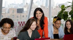 Girls Who Code founder Reshma Saujani center with some of the young women in the club.