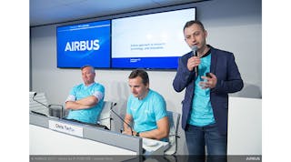 Airbus Chief Technology Officer Paul Eremenko (standing) speaks during a conference at the 2017 Paris Air Show.