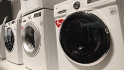 LG washing machines on display at a trade show. LG washing machines on display at a trade show.