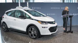 GM CEO Mary Barra with an autonomous Chevy Bolt in December 2016