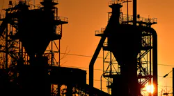 A silhouette of an ArcelorMittal plant in France.