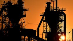A silhouette of an ArcelorMittal plant in France. A silhouette of an ArcelorMittal plant in France.