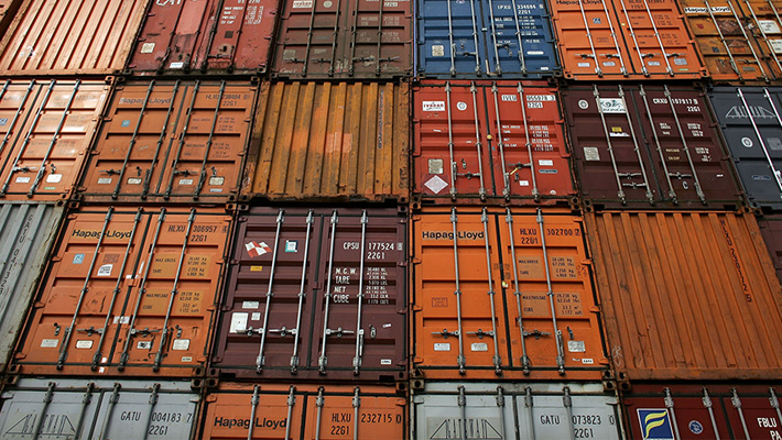 A wall of shipping containers.