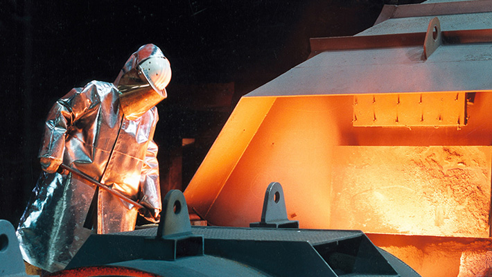 A worker tends to steel production at a thyssenkrupp plant in Duisburg, Germany.