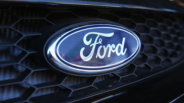 The Ford logo on a front grille.