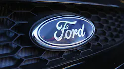 The Ford logo on a front grille.