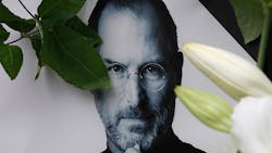 An image of Steve Jobs, surrounded by flowers, following his death in 2011. An image of Steve Jobs, surrounded by flowers, following his death in 2011.