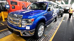 A Ford F-150 pickup truck rolls through the production line in Dearborn, Michigan. A Ford F-150 pickup truck rolls through the production line in Dearborn, Michigan.