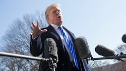 President Donald Trump talks with reporters outside the White House. President Donald Trump talks with reporters outside the White House.
