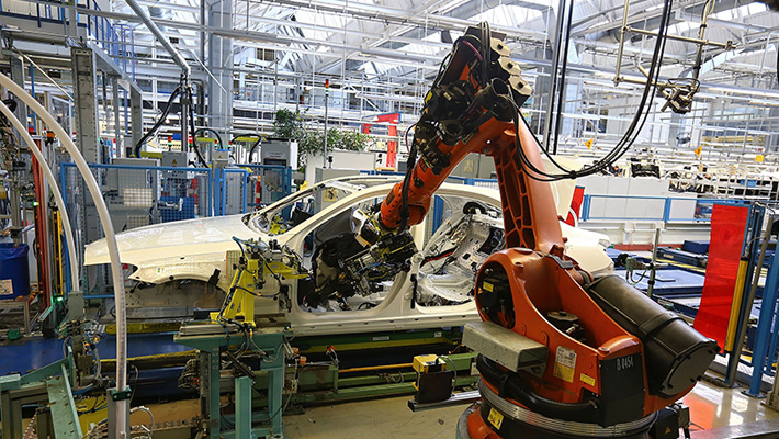 A Kuka AG robotic arm at a Mercedes-Benz plant in Sindelfingen, Germany.