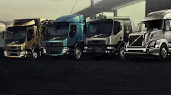 A row of Volvo semi trucks.