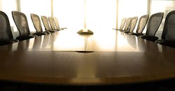 Boardroom table with glare Boardroom table with glare