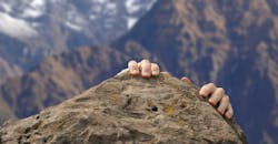 man struggles to reach mountain top man struggles to reach mountain top