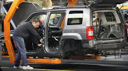 A worker builds a Jeep Compass at the Fiat Chrysler plant in Belvidere, Illinois.