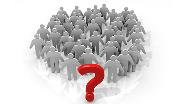 cutout figures being lead by a question mark