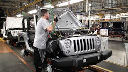 A worker assembles a Jeep Wrangler at the Fiat Chrysler Automotive plant in Toledo, Ohio. A worker assembles a Jeep Wrangler at the Fiat Chrysler Automotive plant in Toledo, Ohio.