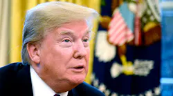 Donald Trump sits in the Oval Office in January 2018.