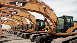 A row of Caterpillar earth-moving equipment. A row of Caterpillar earth-moving equipment.