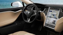 The steering wheel and dashboard user experience inside a Tesla Model S. The steering wheel and dashboard user experience inside a Tesla Model S.