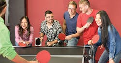 millennials playing ping pong millennials playing ping pong