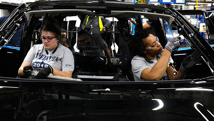 Ford workers assemble the 2018 Expedition at the company's plant in Louisville.