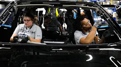 Ford workers assemble the 2018 Expedition at the company's plant in Louisville.