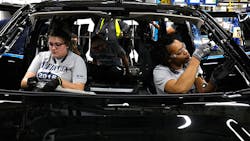 Ford workers assemble the 2018 Expedition at the company's plant in Louisville. Ford workers assemble the 2018 Expedition at the company's plant in Louisville.