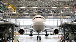 A Boeing 777 airliner at rest in a hangar in Tokyo.