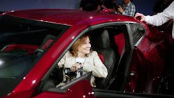 GM CEO Mary Barra sits inside a new Chevy Camaro. GM CEO Mary Barra sits inside a new Chevy Camaro.