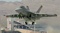 A Boeing F/A-18F Super Hornet takes off from Nellis Air Force Base in Nevada.