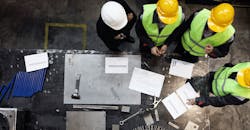 bird's eye view of men in hard hats bird's eye view of men in hard hats