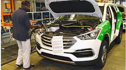 Alabama Hyundai employee works on Santa Fe