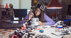 stem-girl-tinkering stem-girl-tinkering