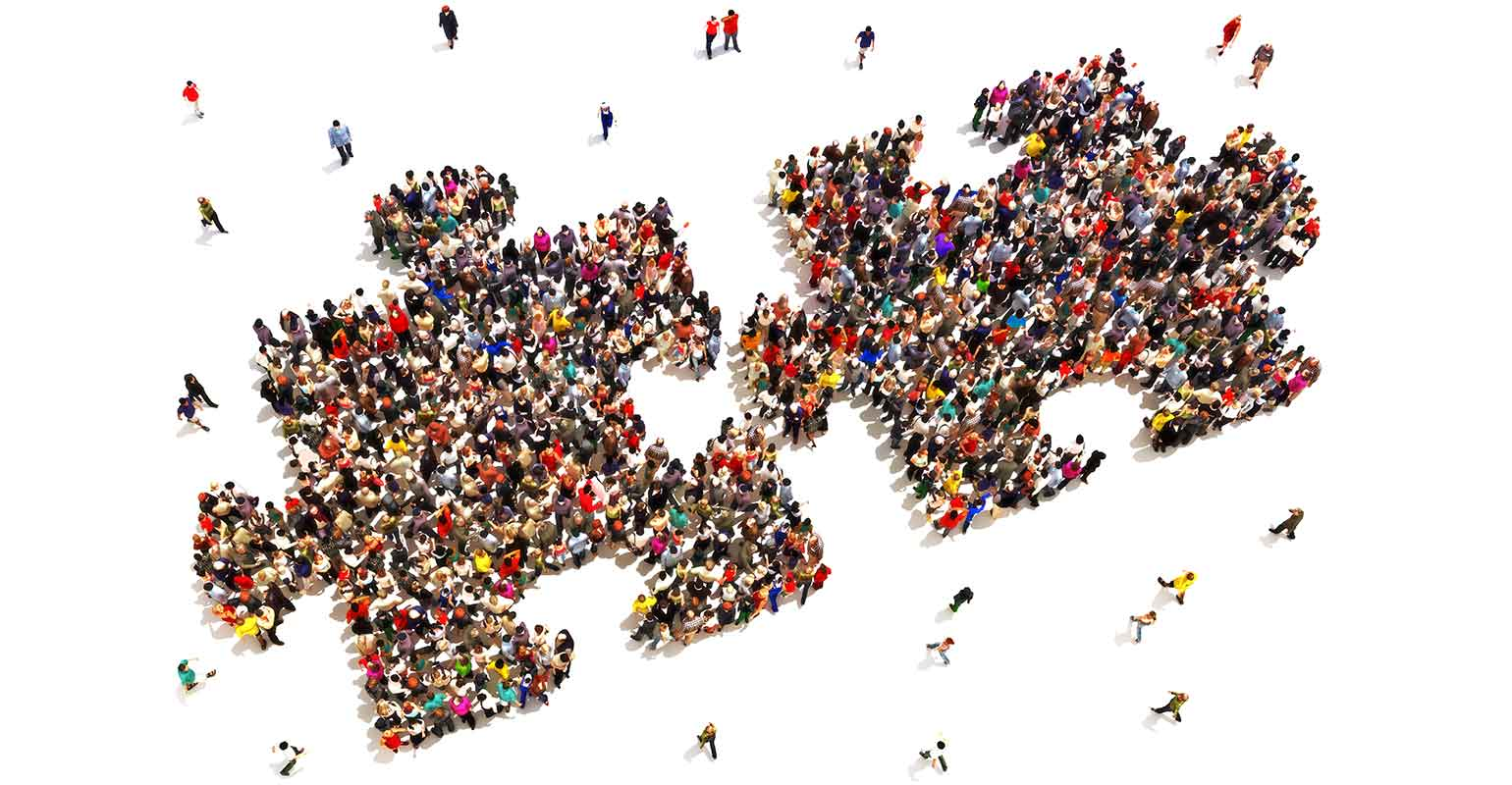 puzzle pieces made of people