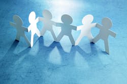 Six white paper dolls on a blue background Six white paper dolls on a blue background