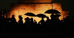 shadow of people with umbrellas shadow of people with umbrellas