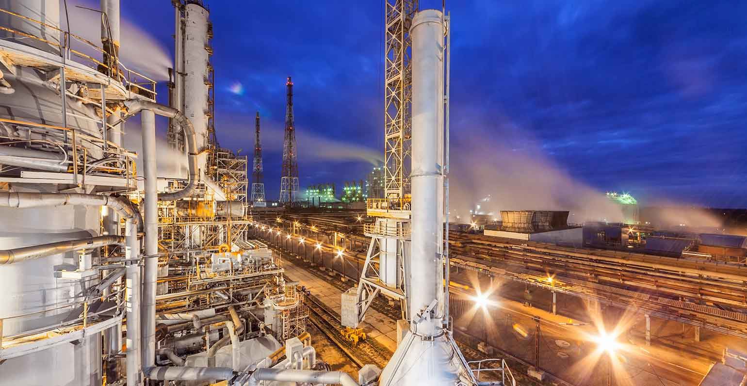 chemical plant at dusk