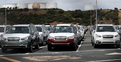 New cars sit in a lot at the Auto Warehousing Co. near the Port of Richmond. New cars sit in a lot at the Auto Warehousing Co. near the Port of Richmond.