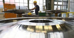 worker at Siemens gas turbine factory in Germany worker at Siemens gas turbine factory in Germany