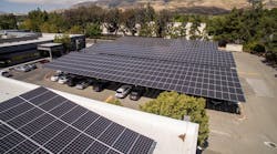 Aerial shot of rooftop and carport solar panels installed at Sonic Manufacturing Technologies ZNE facility in Fremont, Calif.