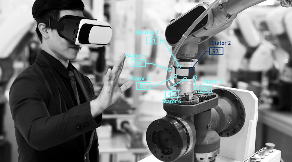 Virtual reality technology in industry 4.0. Business man suit wearing VR glasses to see AR service , Thermal Monitoring motor for check destroy part of smart robot arm machine in smart factory.