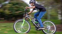 boy on Kent International bicycle