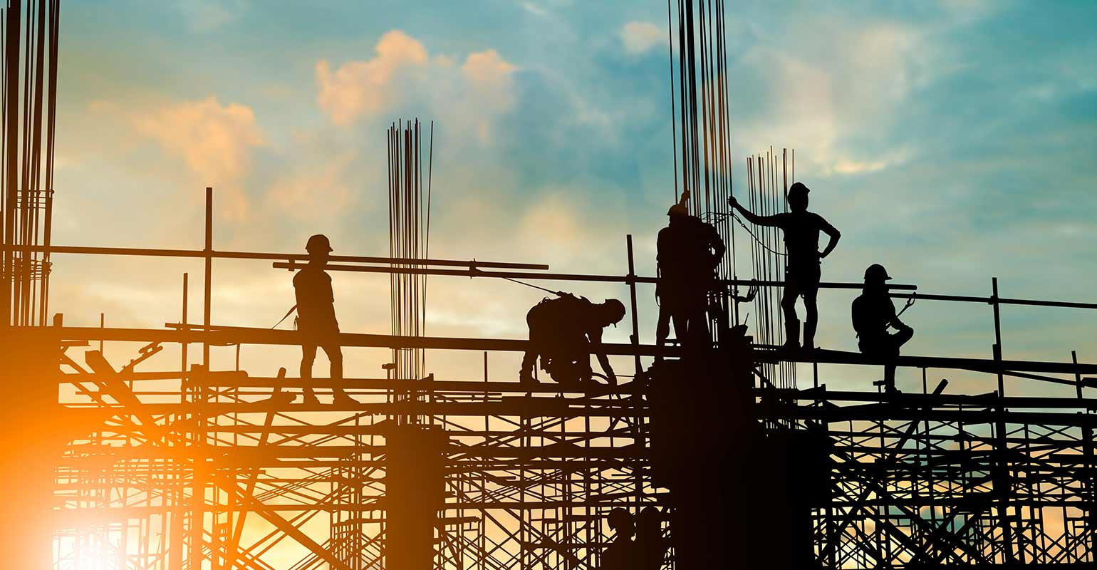 construction workers building a building