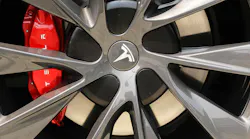 Tesla logo on wheel of Tesla car