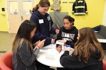 A group of middle school students participating in FlexFactor visit DuPont Silicon Valley Technology Center in California.