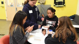 A group of middle school students participating in FlexFactor visit DuPont Silicon Valley Technology Center in California.